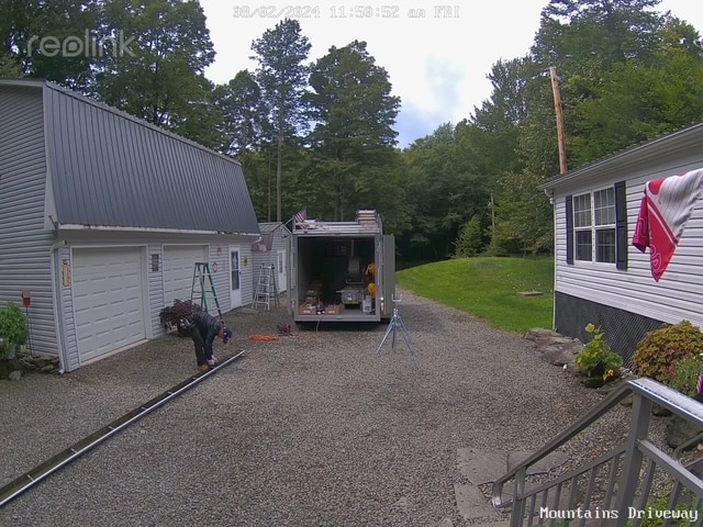 Commonwealth Maintenance crew installing new gutters on a residential home in Jackson, PA