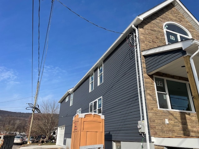 Close-up view of newly installed high-quality gutters on a remodeled Forty Fort home, showcasing seamless connections and proper alignment along the roofline